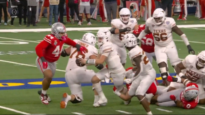 Quinn Ewers gets a pass off.