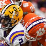 LSU and Clemson players battle.