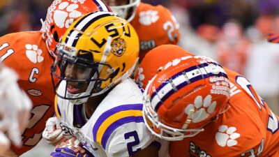 LSU and Clemson players battle.