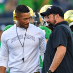 Coaches Marcus Freeman of Notre Dame and Ryan Day of Ohio State.