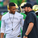 Ryan Day and Marcus Freeman talk before game.