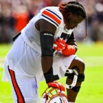 Jeremiah Wright is shown playing for Auburn.
