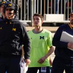 Jim Harbaugh and Connor Stalions are shown.