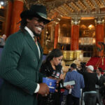 Cam Newton photographed on red carpet at NFL Draft.