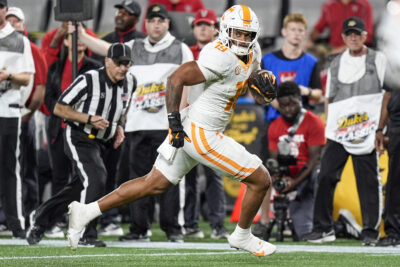 Holden Staes catches a pass for Tennessee.