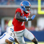 Ayden Williams runs after a reception.