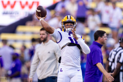 Colin Hurley throws a pass while warming up before a game.