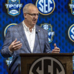 Greg Sankey speaks during a press conference.