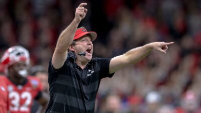 Kirby Smart is shown on the sidelines.