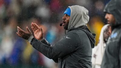 Kelvin Sheppard is shown on the sidelines.