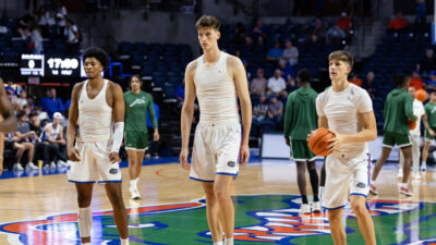 Olivier Rioux warms up before a Florida basketball game.