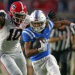 Damon Wilson tried to make a tackle.