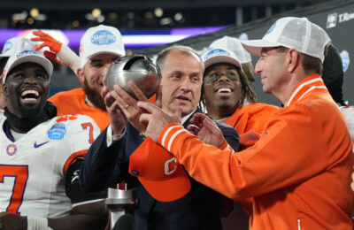 ACC commissioner Jim Phillips and Clemson football coach Dabo Swinney.