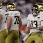 Riley Leonard before a play during the 2025 Orange Bowl.