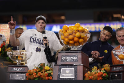Riley Leonard and Marcus Freeman after Notre Dame's win in the Orange Bowl.