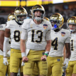 Notre Dame quarterback Riley Leonard celebrates.