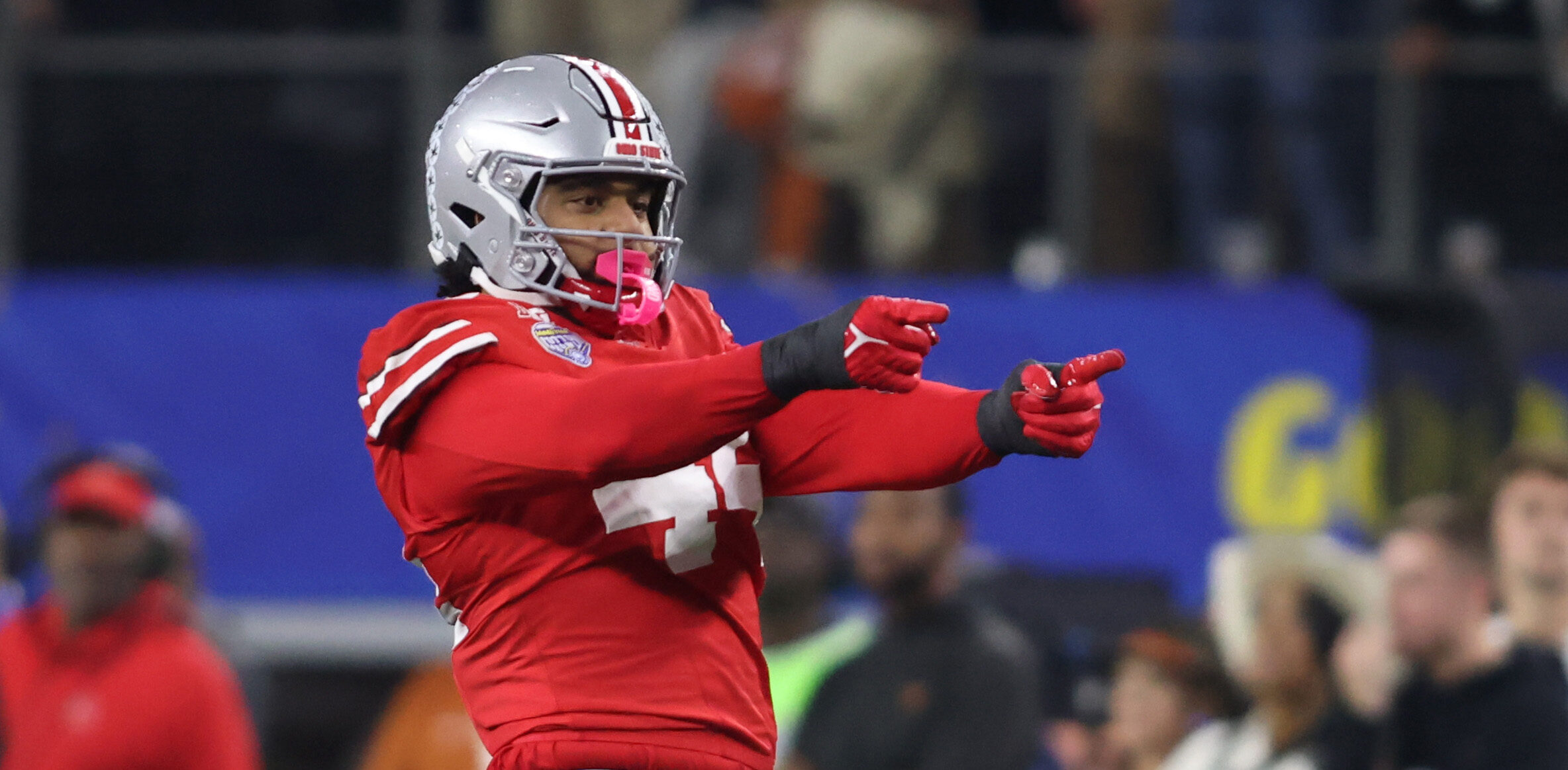 J.T. Tuimoloau, star Ohio State DE, suffers apparent ankle injury vs. Texas
