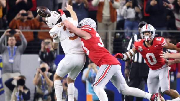 Quinn Ewers gets hit by Jack Sawyer late in the Cotton Bowl.