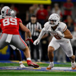 Trey Moore lines up for a play against Ohio State.