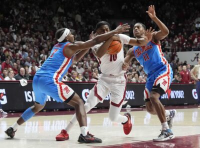 Ole Miss plays defense on Alabama.