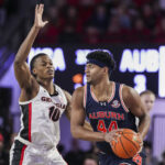 Georgia and Auburn players in action.