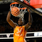 Felix Okpara dunks the basketball in a game in 2025.