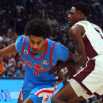 Ole Miss and Mississippi State players in action.