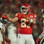 Travis Kelce celebrates a first-down catch during the Chiefs' win against the Houston Texans.