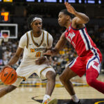 Mizzou and Ole Miss players in action.