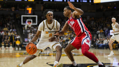 Mizzou and Ole Miss players in action.