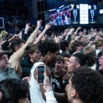 Vanderbilt fans celebrate on the court at Memorial Gym.