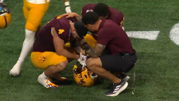 Cam Skattebo consoled by teammates after Herculean Peach Bowl effort