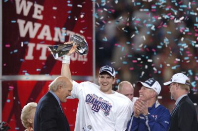 Eli Manning is shown.