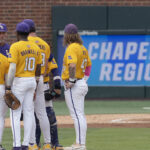 LSU baseball team in a huddle.