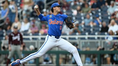 Liam Peterson delivers a pitch during the College World Series in 2024.