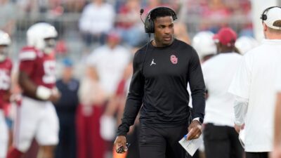 DeMarco Murray shown coaching during game.