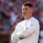 Seth Littrell is shown.
