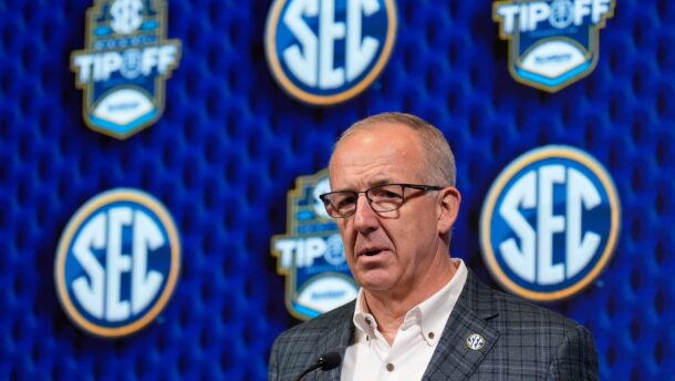 SEC Commissioner Greg Sankey at the podium.