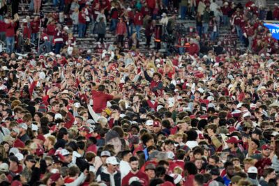 Oklahoma fans rushed the field after beating Alabama in 2024.