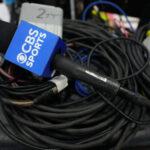 CBS logo on a microphone is shown.