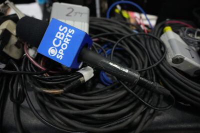 CBS logo on a microphone is shown.