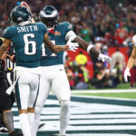 DeVonta Smith shown celebrating a touchdown.