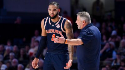 Bruce Pearl and Johni Broome are shown.