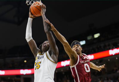 Mark Mitchell attempts a shot against Oklahoma.