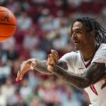 Labaron Philon of Alabama makes a pass during a game against Mississippi State.