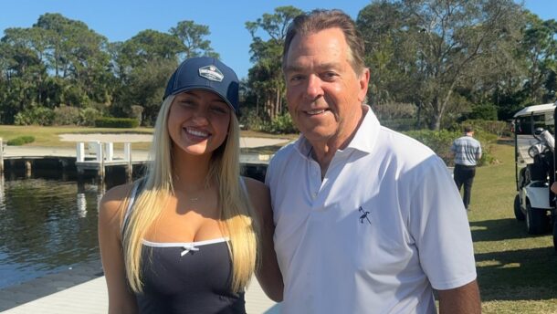Alabama student Sydney Thomas with Nick Saban.