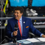 Greg Gumbel is shown.
