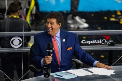 Greg Gumbel is shown.