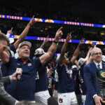 Auburn celebrates the 2024 SEC Tournament title.