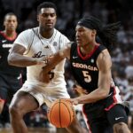 Silas Demary Jr. dribbles the ball for Georgia against Texas A&M.